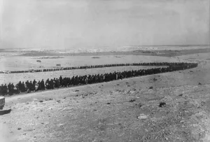 Libya Prints: 25, 000 German and Italian prisoners marching to Tobruk harbor, seen in middle distance