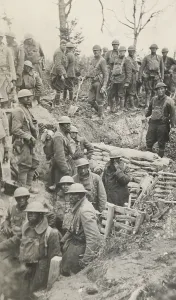 Three Quarter Prints: 302nd Engineer Regiment (with shovels) repairing a roadway over a trench in 1918