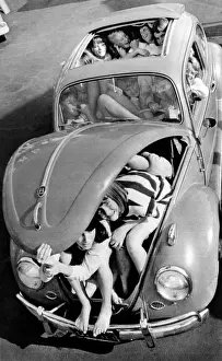 Fads Prints: 31 teenagers stuffed into a Volkswagen Beetle
