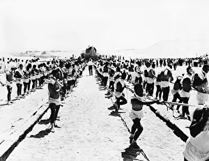 Water Transport Prints: 500 costumed Cairo students drag the 10 ton papyrus raft RA along wooden planks