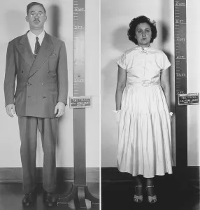 December Prints: Accused atomic spy Julius and Ethel Rosenberg in a standing mug shot. 1951