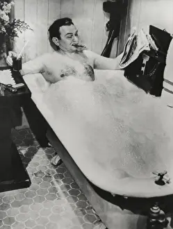 Bubbles Prints: Actor Edward G. Robinson, in a bubble bath with his cigar