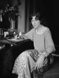 Comedienne Prints: Actress Fanny Brice, writing at desk, c