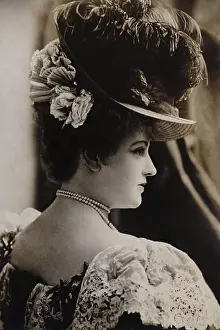 Comedienne Prints: Actress Lillian Russell wears an elaborate ostrich feather hat, pearls, and lace, c. 1890s
