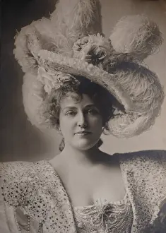 Comedienne Prints: Actress Lillian Russell wears an ostrich feather hat and embroidered and jeweled dress