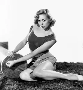 Clock Prints: Adele Mara, reminding her fans that Standard Time resumes on September 27, 1953