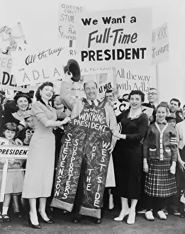 Stevenson Prints: Adlai E. Stevenson was presented with signature-decorated blue denim overalls from supporters