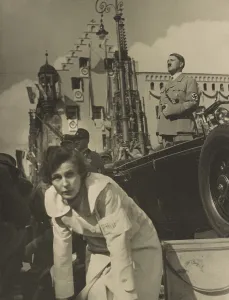 Actresses Prints: Adolf Hitler standing in an open automobile