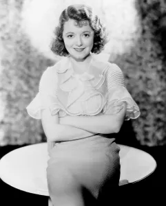Images Dated 25th July 2014: ADORABLE, Janet Gaynor, in a dress by Rita Kaufman