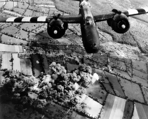 Explosions Prints: Aerial view of a A-20 G Havoc light bomber with D-Day invasion stripes painted on its wings