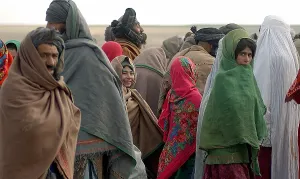 Turbans Prints: Afghani refugees in Sakhi Camp in Mazar-e Sharif Kandahar Afghanistan to collect humanitarian aid from Doctors Without