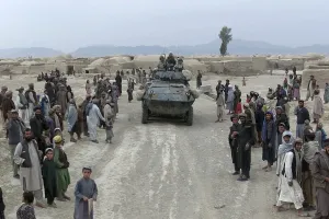 Primitive Architecture Prints: Afghans mostly men and boys greet Marines on patrol in a village near Kandahar