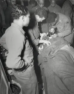 The Right To Fight Prints: African American Army surgeon stitches face and shoulder wounds in the Pietrasanta Area