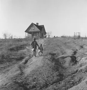 Erosion Prints: African American children walk from their old home on badly eroded land during the Great Depression
