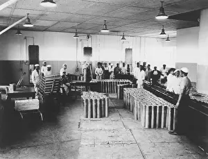 Explosives Prints: African American enlisted men working on the load line at the Hastings Ammunition Depot
