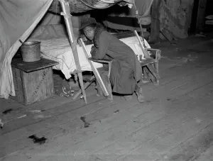 Negro Prints: African American girl in infirmary after flood
