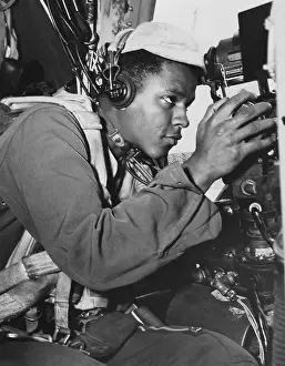 Parachutes Prints: African American gunner on a B-29 Super Fortress of the 98th Bomb Wing during the Korean War
