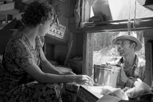 Negro Prints: African American man making purchases at a traveling store