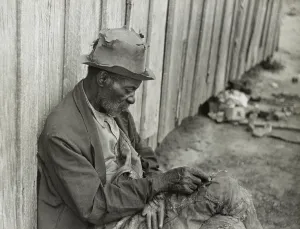 Alabama Prints: African American man with missing fingers wearing tattered clothing