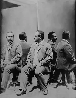 Complexity Prints: African American man posed, in front of mirrors