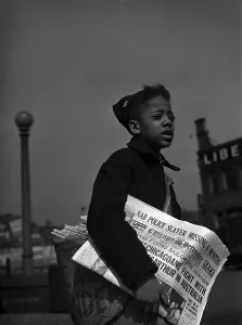 News Prints: African American newsboy, original caption: Newsboy selling the Chicago Defender