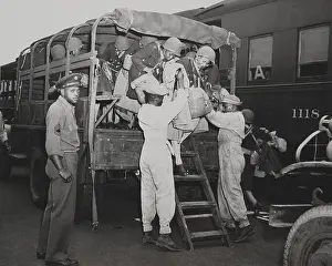 Trucks Prints: African American nurses are helped out of an Army truck