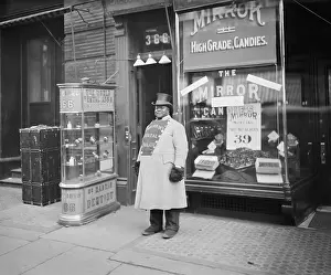 Overcoat Prints: African American promoting Dr. Ranklins Dental Parlor with on his doubled breasted coat