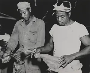 Non Combat Prints: African American quartermaster soldiers repairing battle boots worn by fighting troops