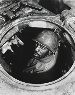 Turret Prints: African American soldier in the turret of an armored vehicle during World War 2