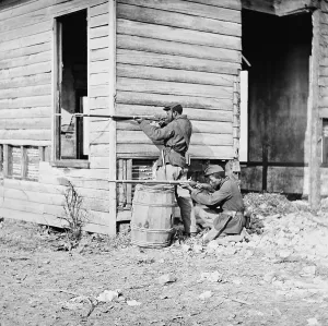 Images Dated 12th August 2009: African American soldiers aim their rifles at a picket station near Dutch Gap Canal