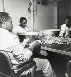 Cooks Prints: African American steward mates dry silverware in the wardroom of the U.S.S. Ticonderoga