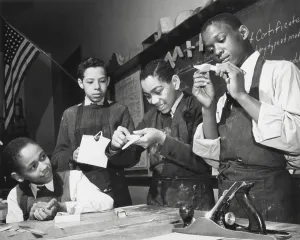 War Effort Prints: African American students making model airplanes for U.S. Navy during World War 2