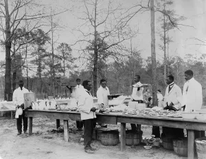 Teacher Prints: African American students serving a meal in an outdoor setting at Tuskegee Institute