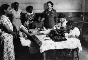 Secretary Prints: African American students at work in a library