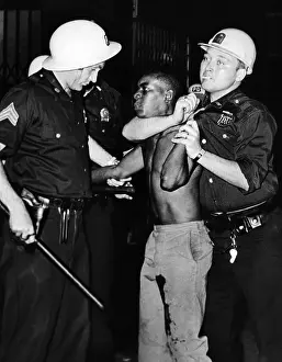 Urban Poverty Prints: African American who has been shot in the leg