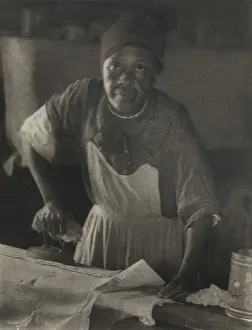 Shadows Prints: African American woman ironing, ca