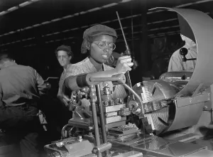 Machinery Prints: African American woman lathe operator at a Midwest supercharger plant
