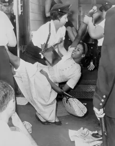 Brooklyn Prints: African American woman resisting her arrest as she is carried to a paddy wagon during a civil rights demonstration