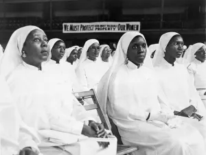 Rally Prints: African American women dressed in white at a Nation of Islam meeting in New York City