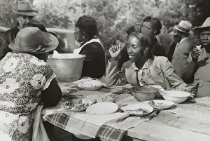 North Carolina Prints: African American women at an outdoor picnic near Yanceyville