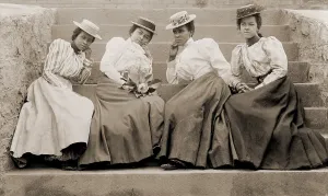 Higher Education Prints: Four African American women students seated on steps of building at Atlanta University
