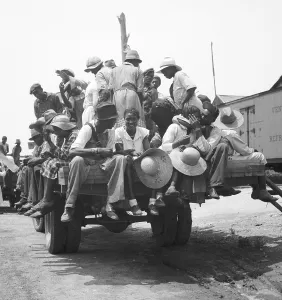 Day Laborers Prints: African American workers on the back of a truck earned 75 cents a day