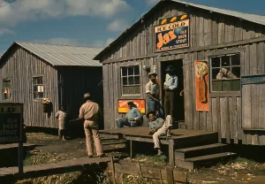 Harvesters Prints: African Americans migrant workers hanging out at a Juke Joint in Belle Glade