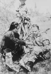 Proxy Wars Prints: US Air Force Captain Wilmer Newk Grubb is given first aid by his captors in North Vietnam