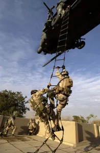 Iraq Prints: US Air Force Rescue Squadron climb into a helicopter near the Baghdad International Airport Iraq