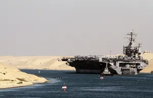 Aircraft Carriers Prints: Aircraft carrier USS HARRY S. TRUMAN passes underneath the Suez Canal Bridge in El Qantara Egypt