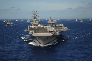 Australia Prints: Aircraft carrier USS Ronald Reagan leads a formation of allied ships from through the Pacific Ocean