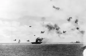 Bombs Prints: The aircraft carrier USS Yorktown being hit by dive bombers at the Battle of Midway