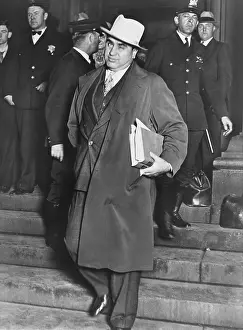 Courthouse Prints: Al Capone, winks at photographers as he leaves Chicago's federal courthouse