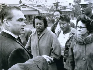 Segregationists Prints: Alabama Gov. George Wallace talks to residents of an African American neighborhood that was bombed
